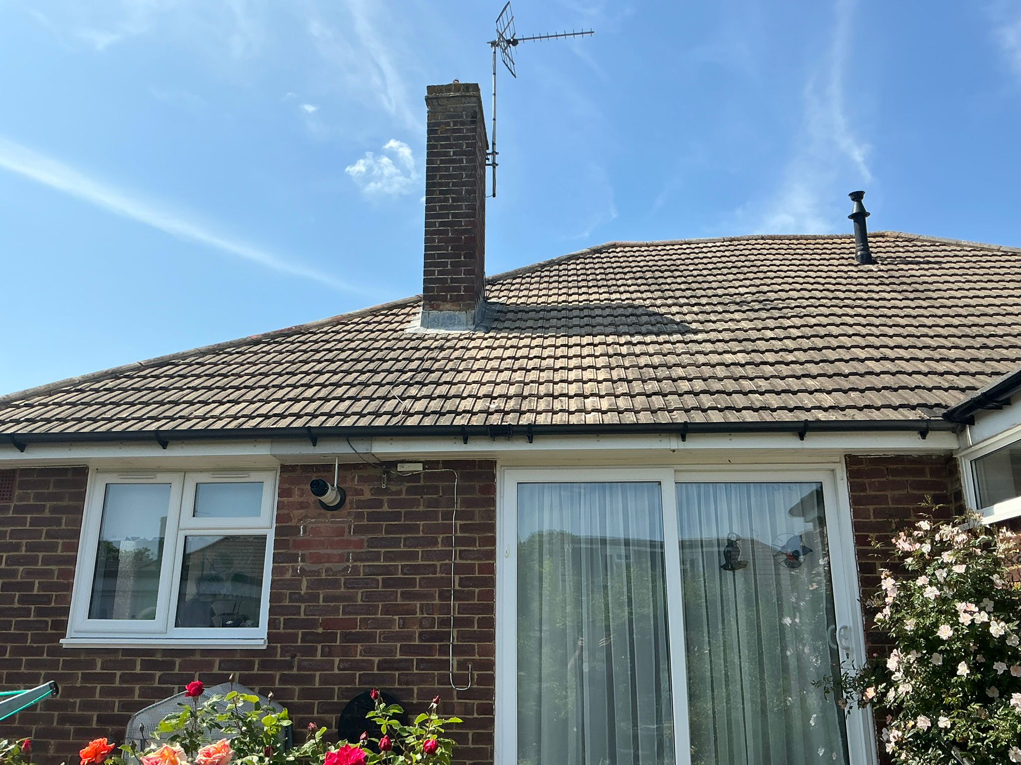 Bungalow roof tiles clean and moss-free after professional roof cleaning service in Kent