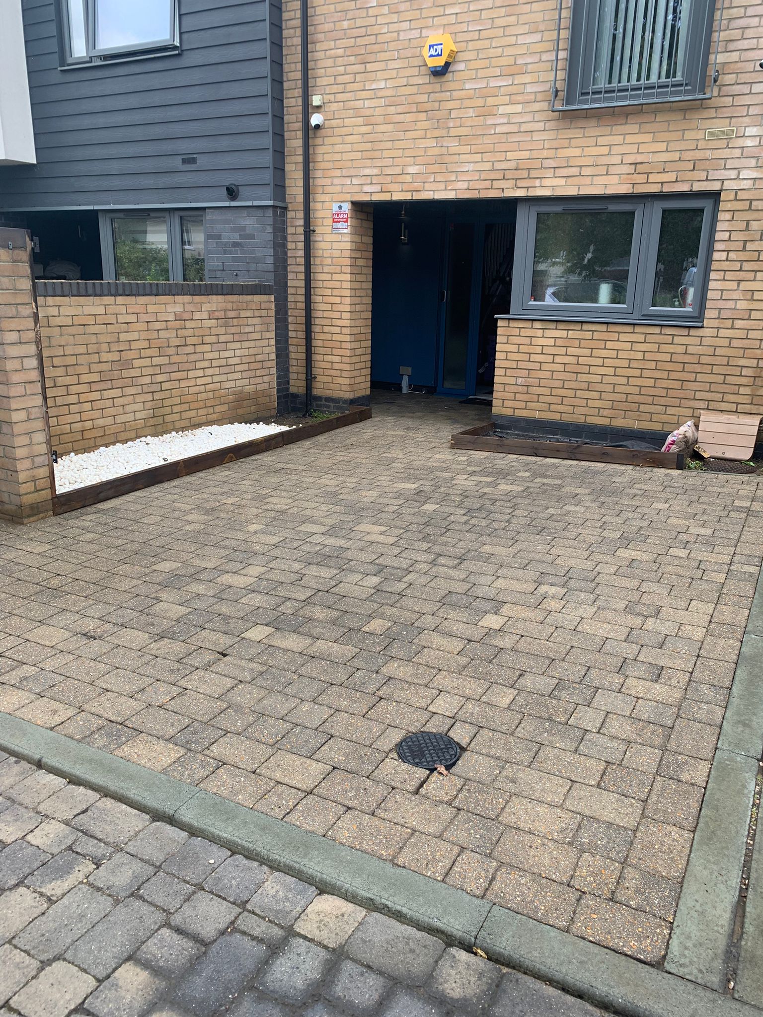 Commercial block paving courtyard fully clean and restored after professional pressure washing in Kent